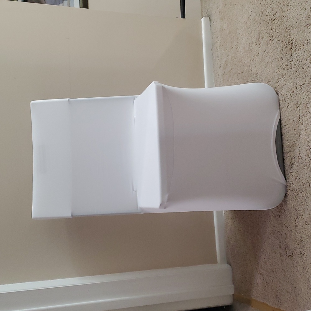 White spandex chair covers.